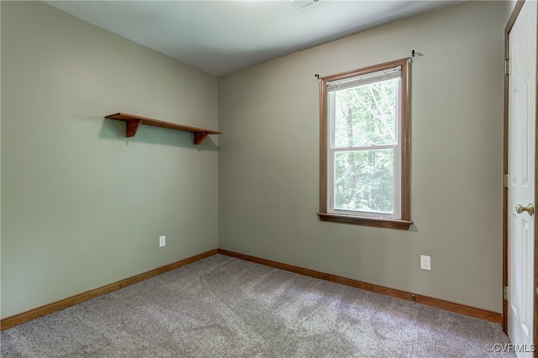 4509 Lockin Road Powhatan, VA 23139 - Photo 21 of 38 Spare room with carpet floors and baseboards