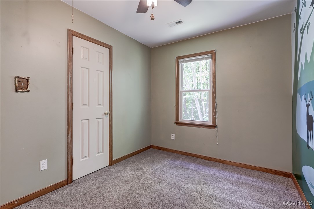 4509 Lockin Road Powhatan, VA 23139 - Photo 23 of 38 Spare room featuring carpet flooring, baseboards,