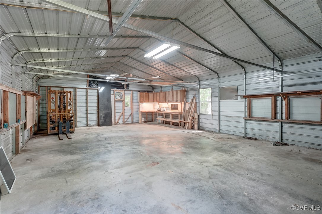 4509 Lockin Road Powhatan, VA 23139 - Photo 36 of 38 Garage with metal wall