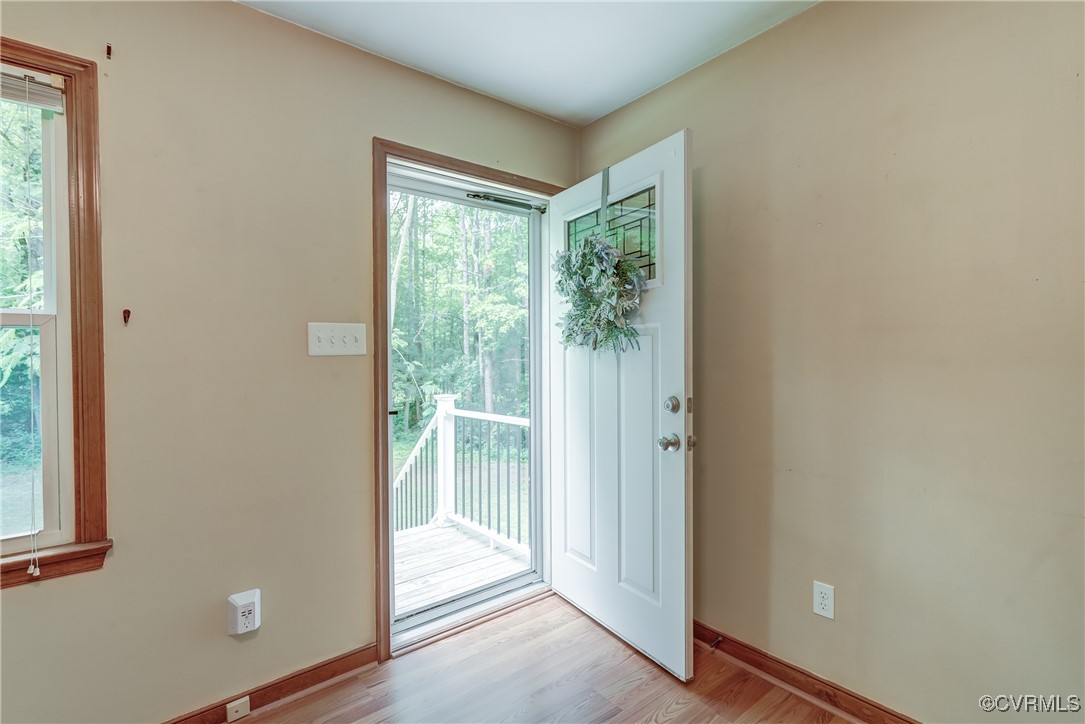 4509 Lockin Road Powhatan, VA 23139 - Photo 4 of 38 Doorway featuring wood finished floors and baseboa