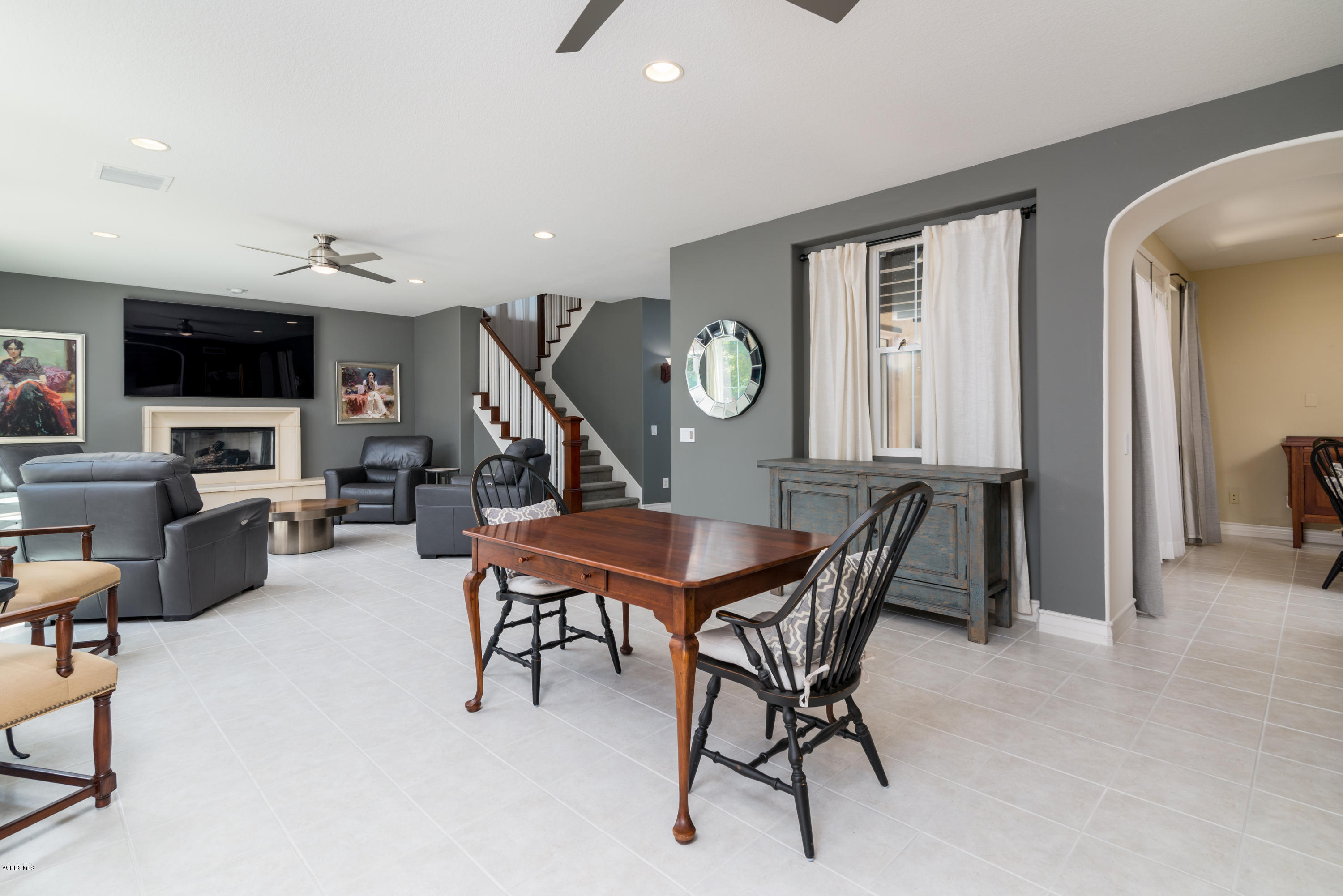 258 Spruce Circle Simi Valley, CA 93065 - Photo 16 of 46 a dining room with furniture and a flat screen tv