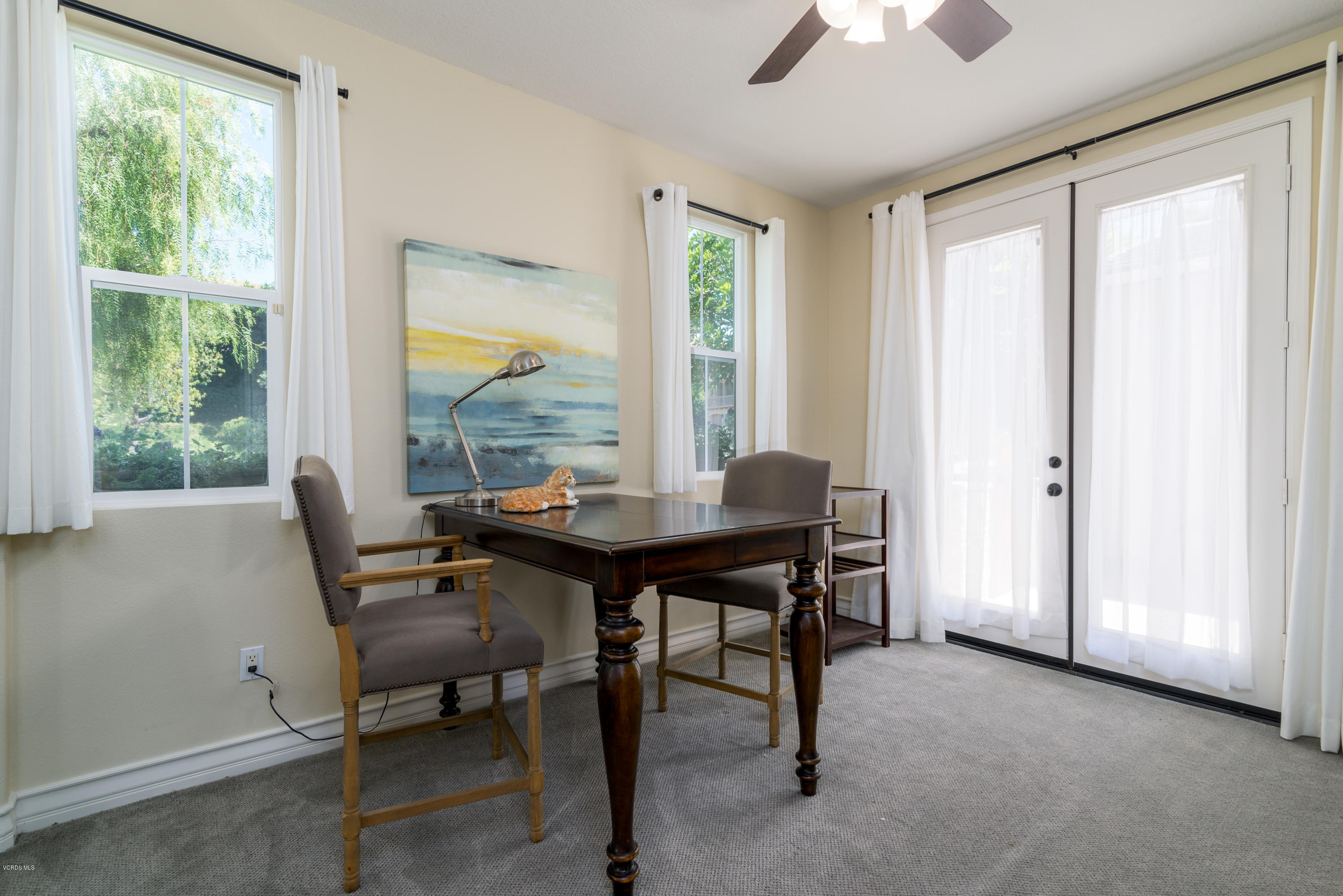 258 Spruce Circle Simi Valley, CA 93065 - Photo 19 of 46 a view of a dining room with furniture window and outside view