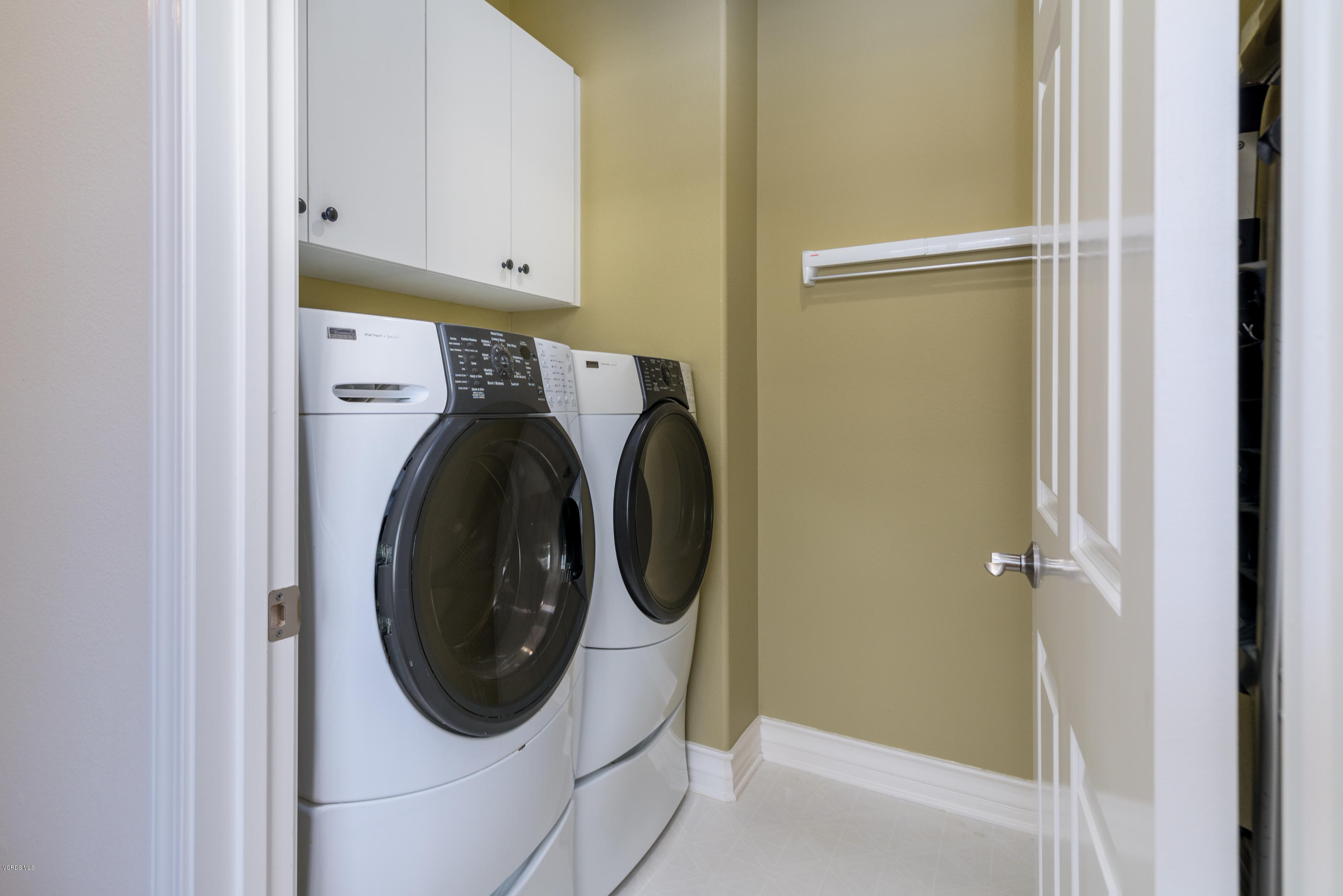 258 Spruce Circle Simi Valley, CA 93065 - Photo 22 of 46 a utility room with dryer and washer