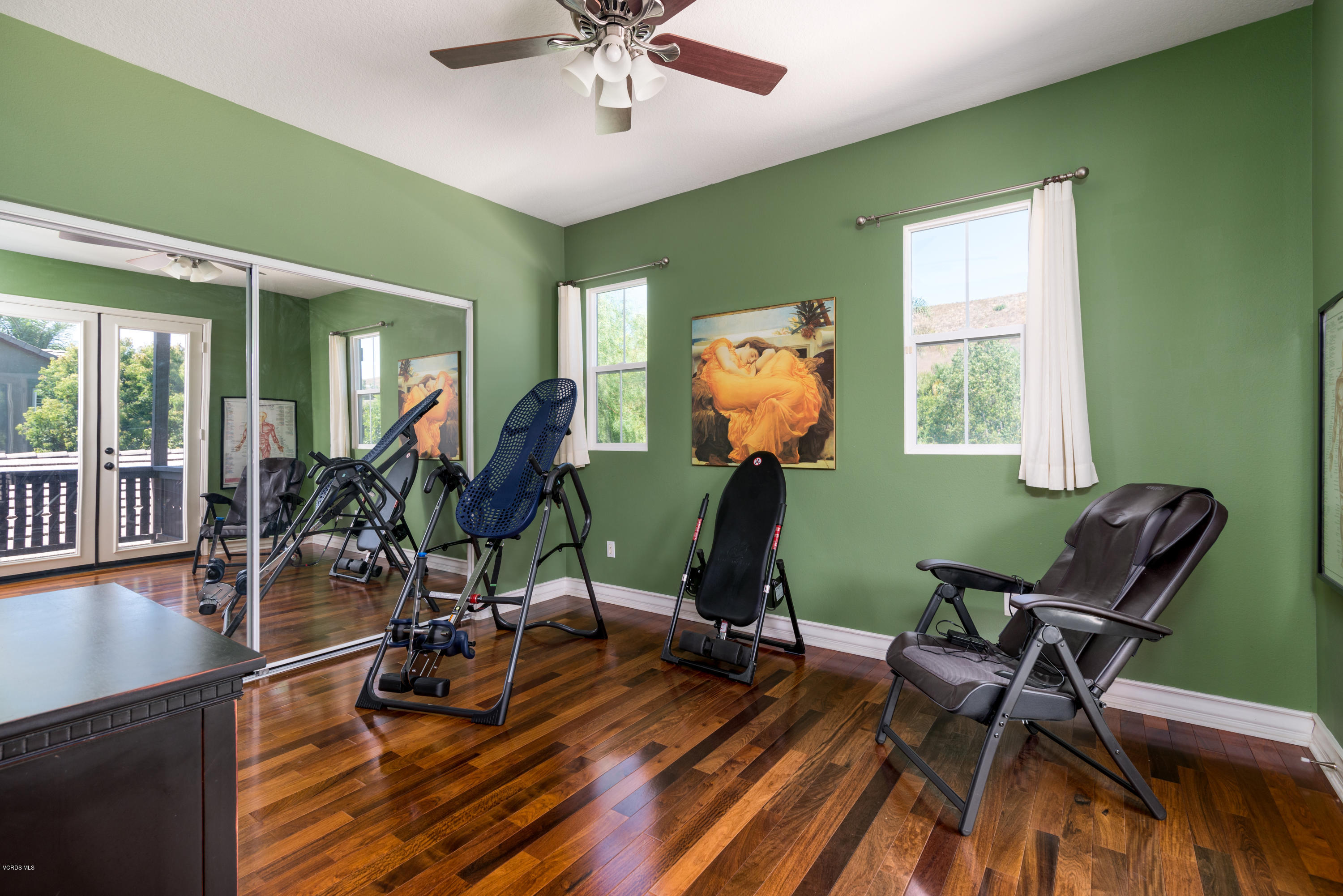 258 Spruce Circle Simi Valley, CA 93065 - Photo 23 of 46 a view of a room with gym equipment and windows