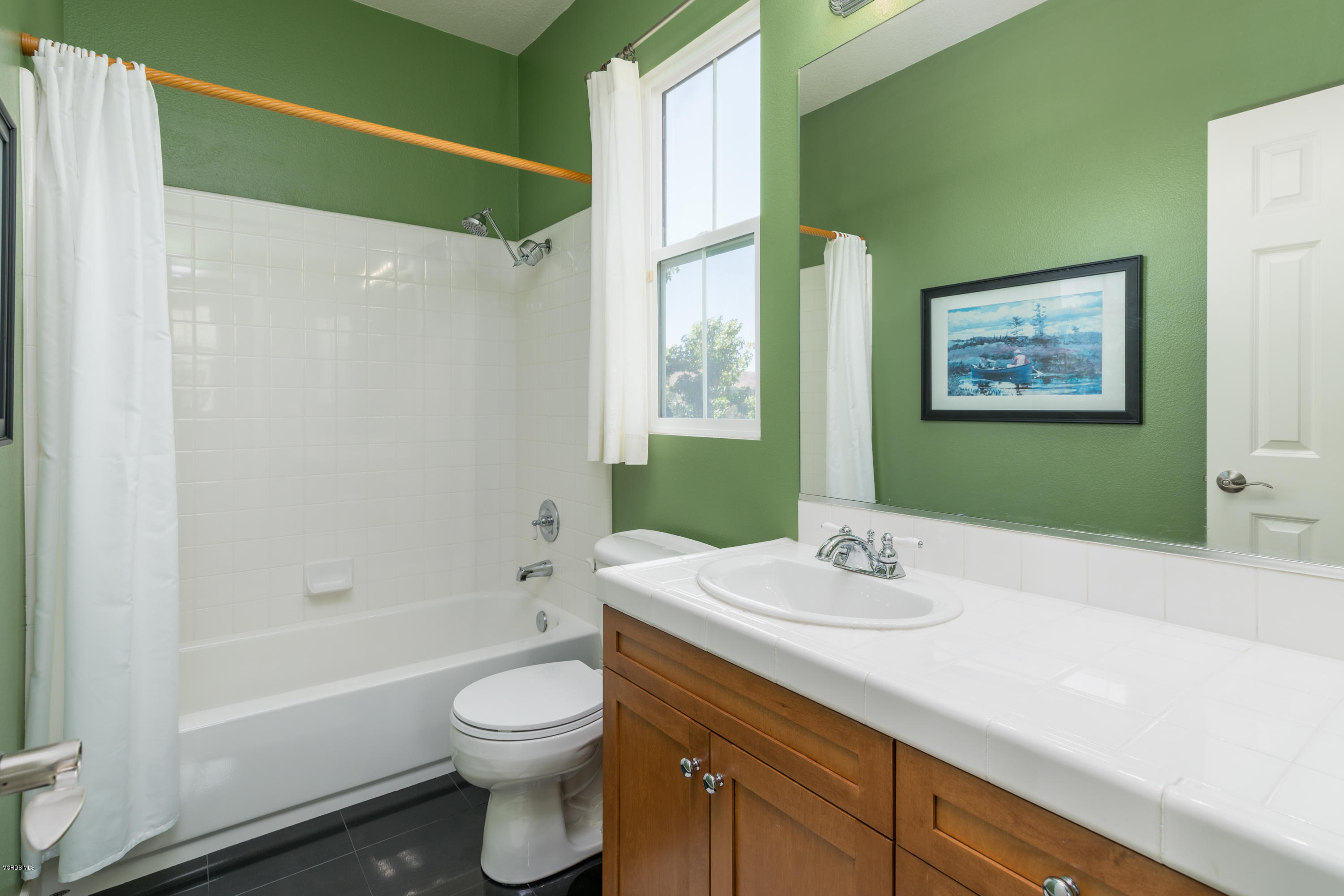 258 Spruce Circle Simi Valley, CA 93065 - Photo 25 of 46 a bathroom with a sink a toilet and shower