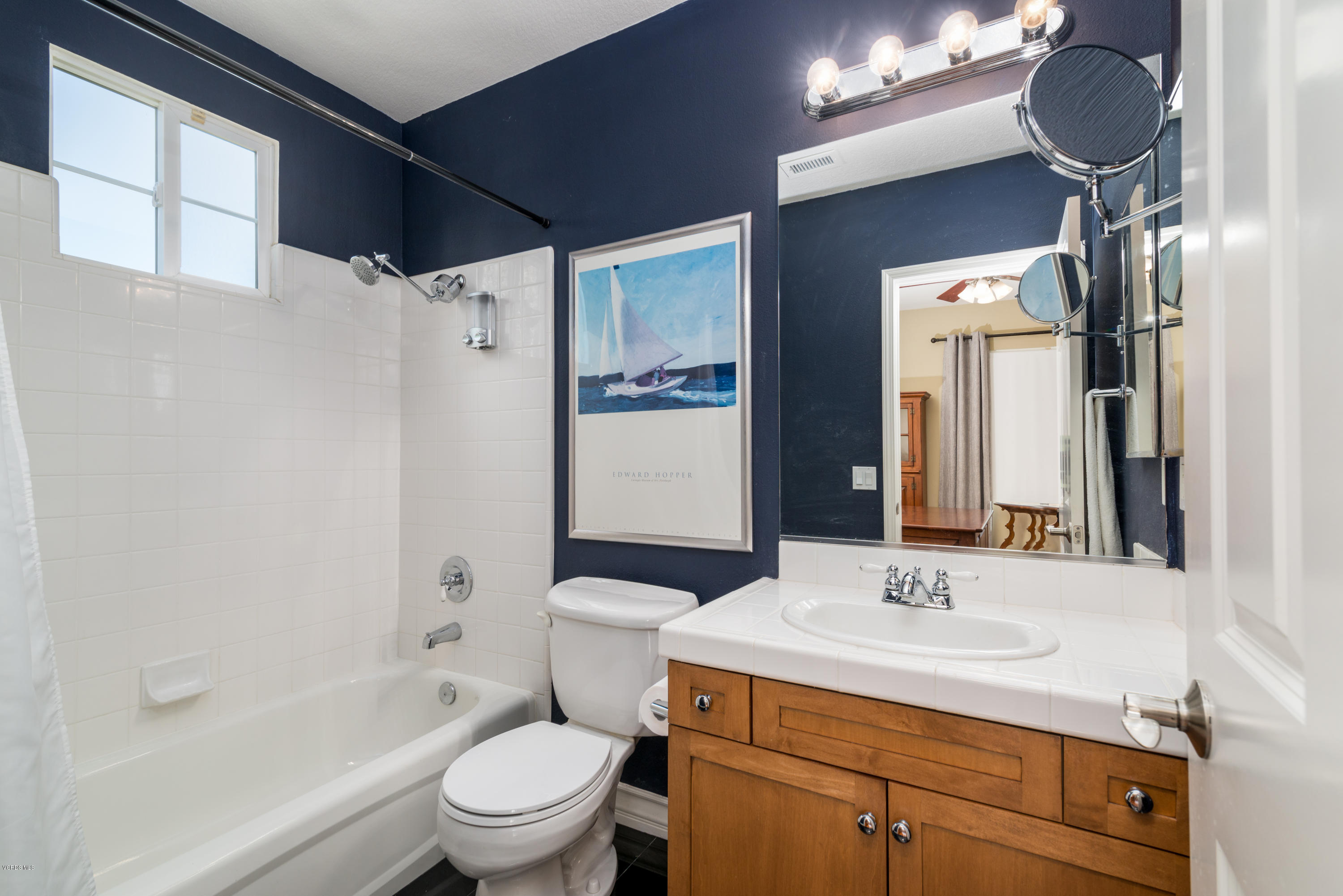 258 Spruce Circle Simi Valley, CA 93065 - Photo 27 of 46 a bathroom with a sink toilet and shower