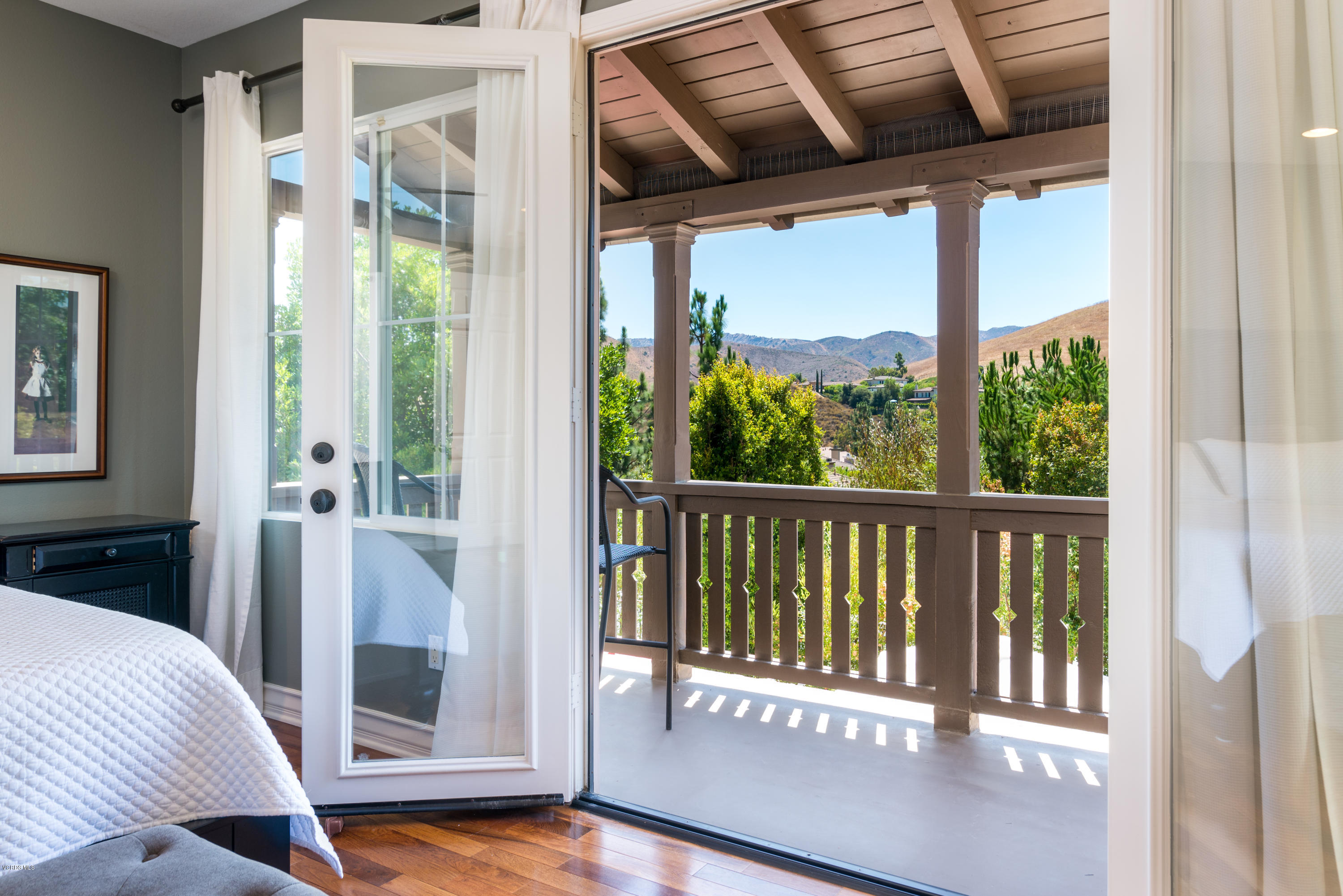 258 Spruce Circle Simi Valley, CA 93065 - Photo 30 of 46 a view of a balcony with wooden floor