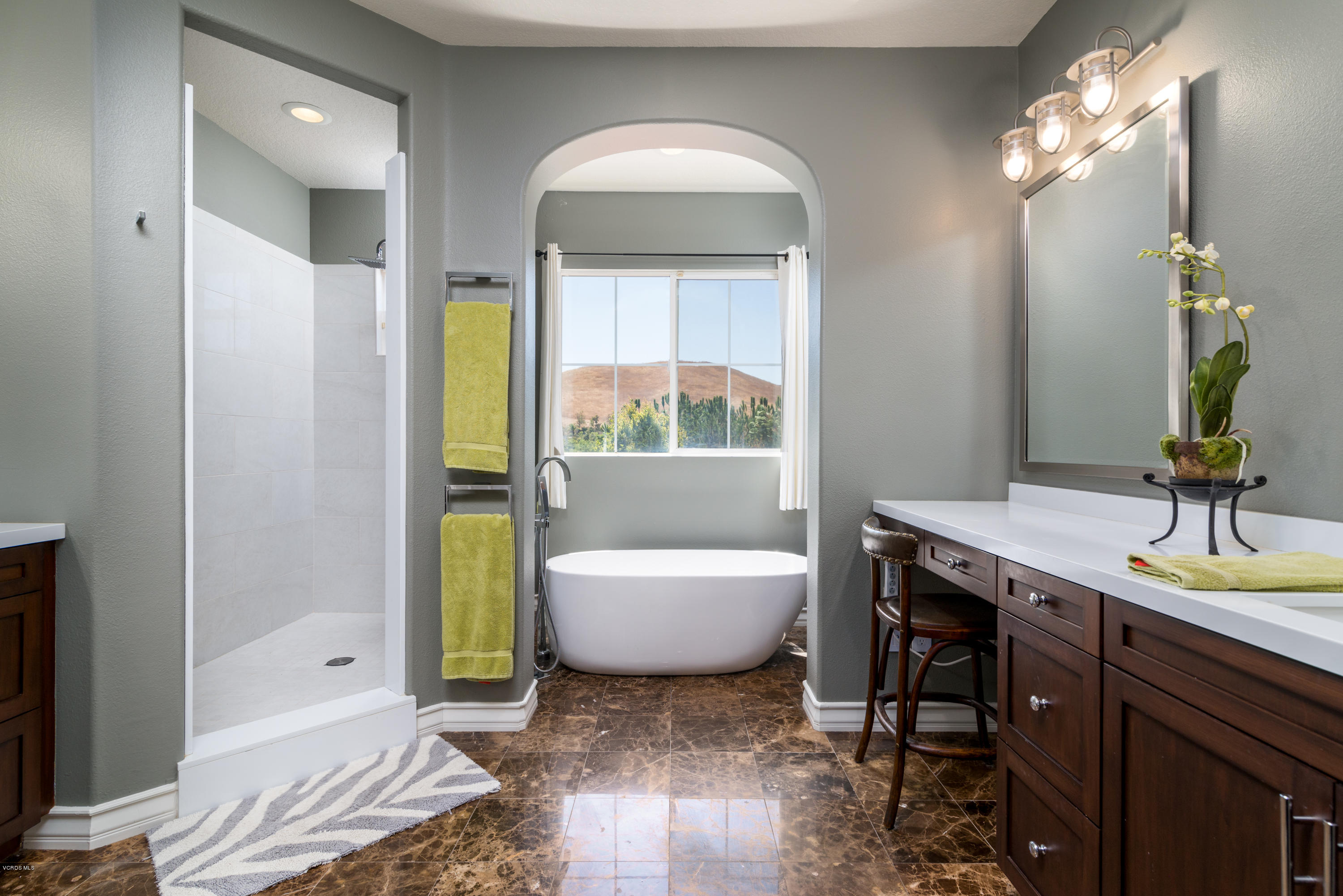 258 Spruce Circle Simi Valley, CA 93065 - Photo 32 of 46 a bathroom with a sink and a mirror