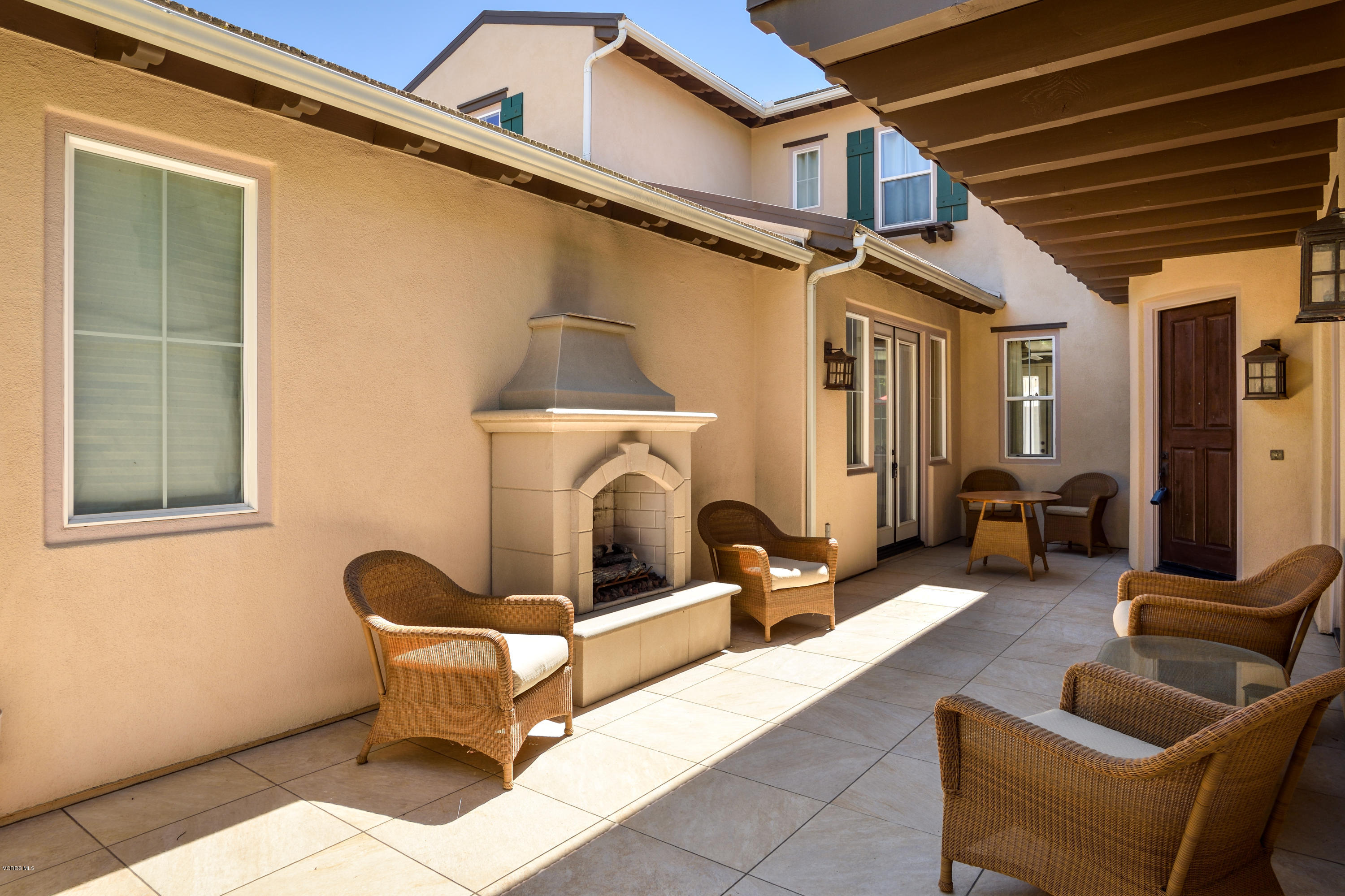 258 Spruce Circle Simi Valley, CA 93065 - Photo 5 of 46 a building outdoor space with patio furniture