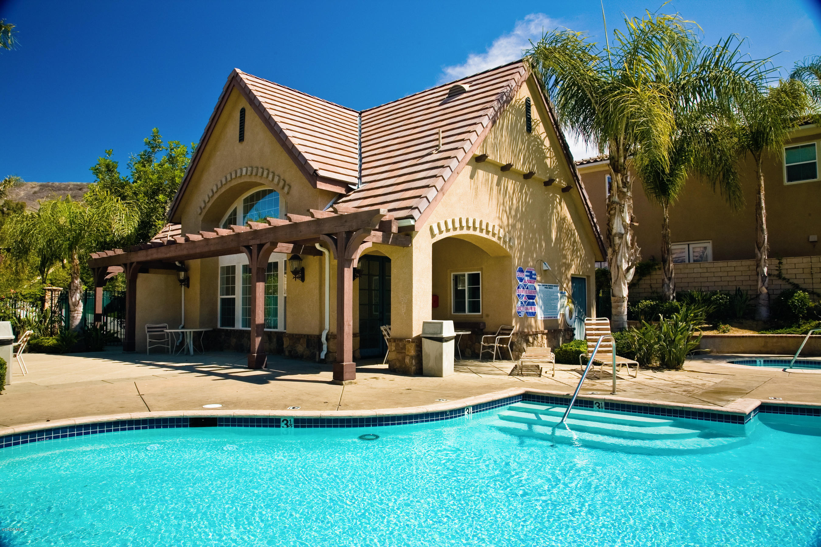 258 Spruce Circle Simi Valley, CA 93065 - Photo 45 of 46 a view of a house with swimming pool and sitting area