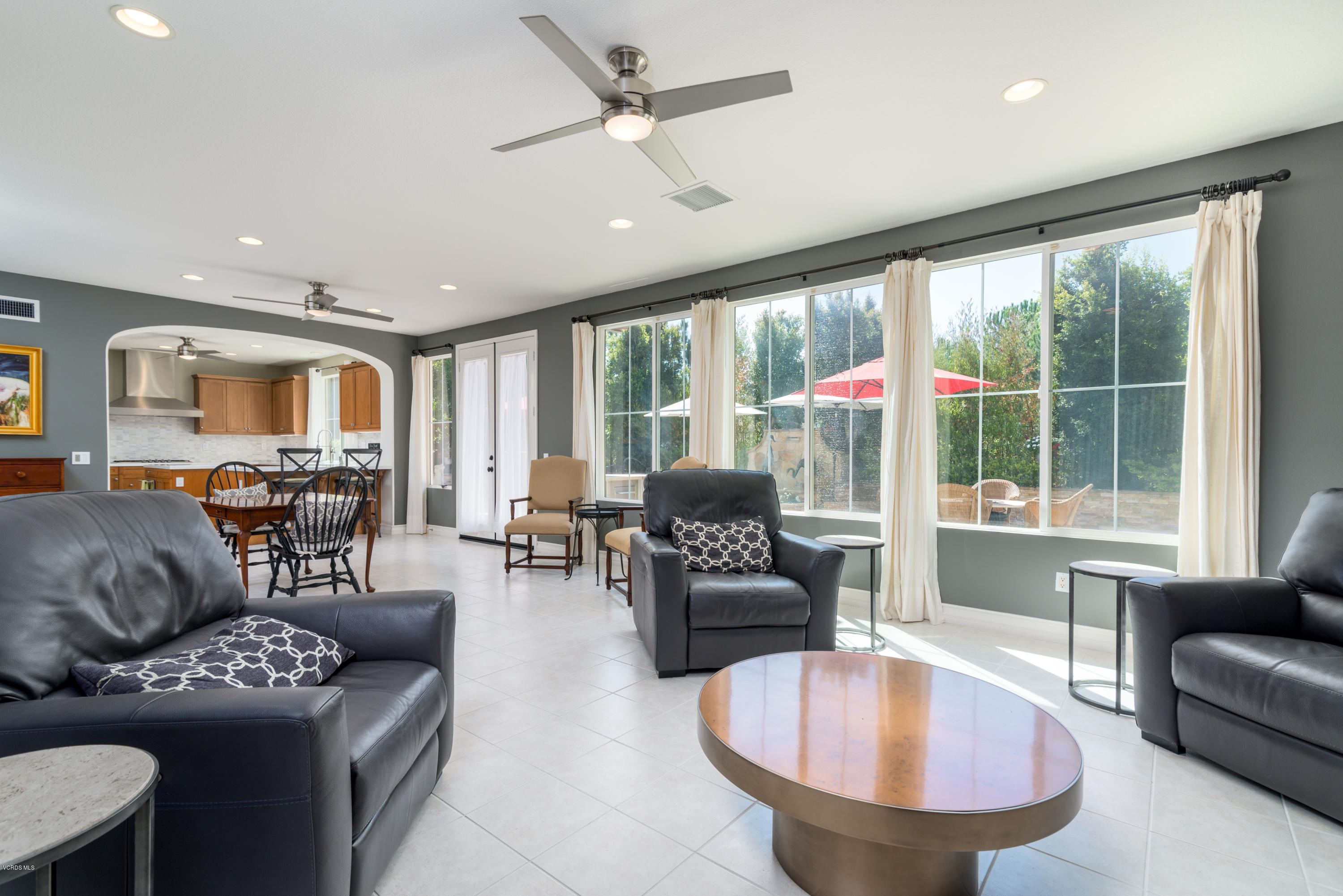 258 Spruce Circle Simi Valley, CA 93065 - Photo 8 of 46 a living room with furniture and a large window