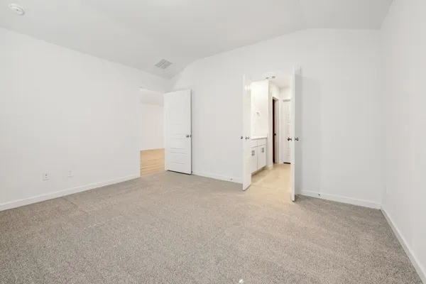 a bathroom with a double sink shower and a mirror