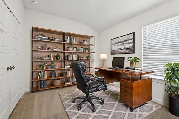 an empty room with closet area