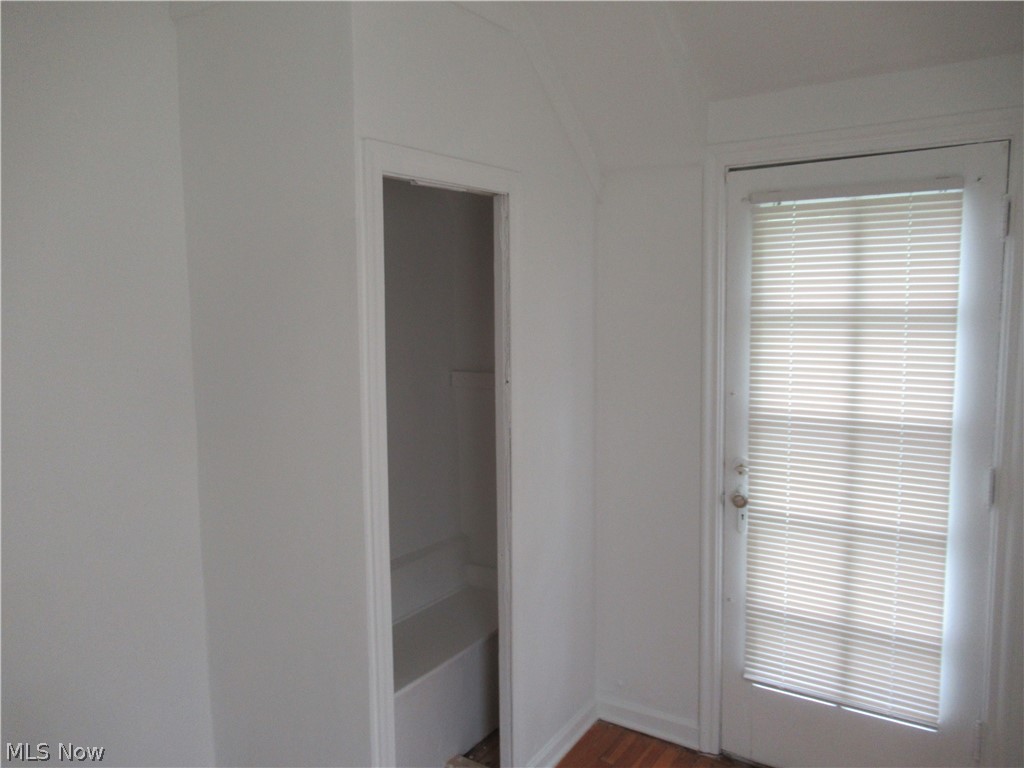 3824 East Antisdale Road Cleveland, OH 44118 - Photo 21 of 27 White interior walls with wood-finish flooring