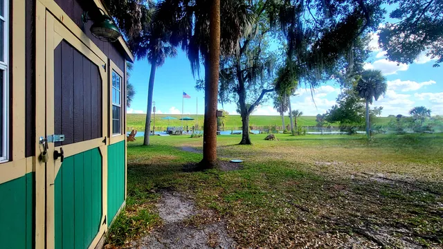 a view of a backyard with a patio