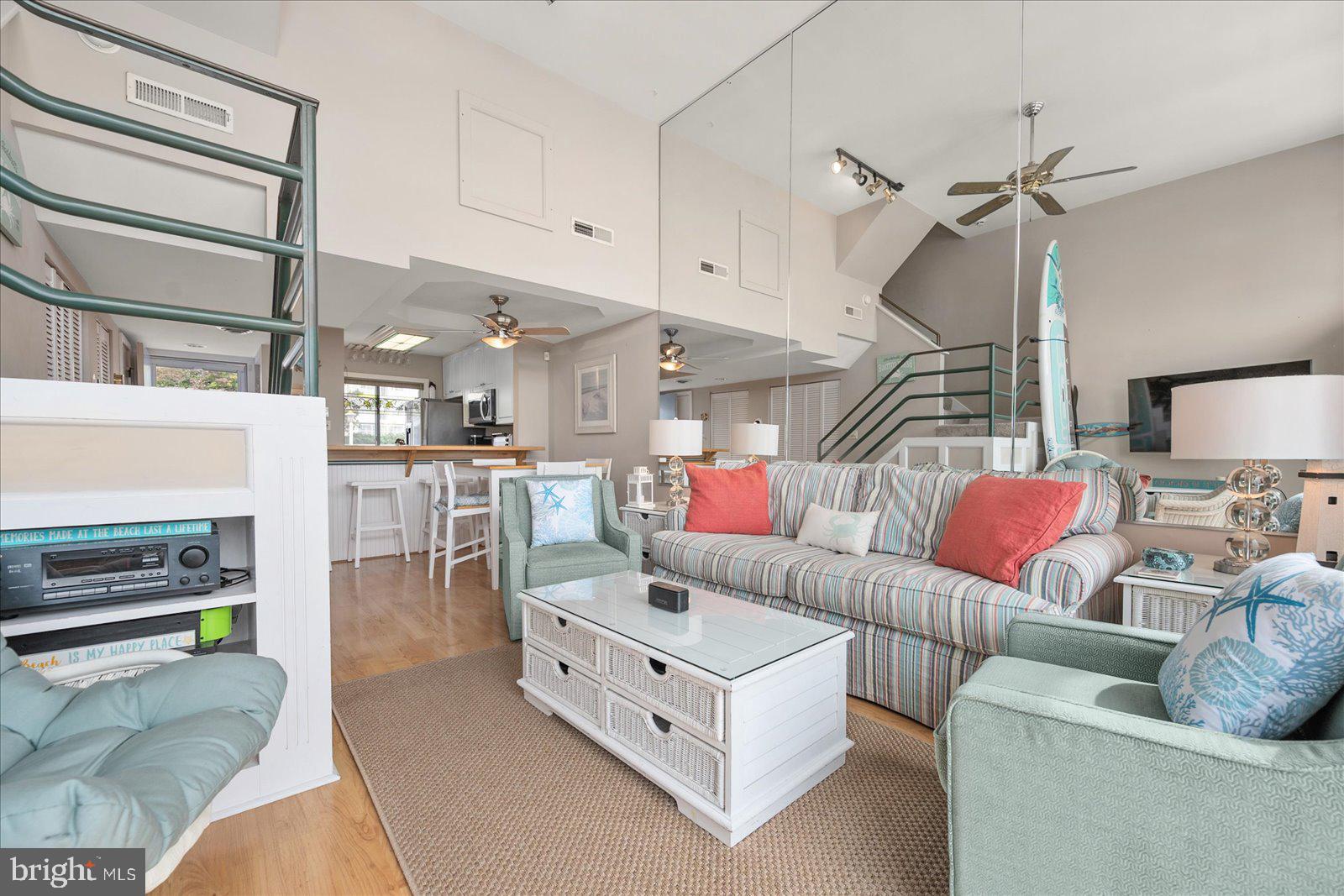 775 94th Street, Unit 775 Ocean City, MD 21842 - Photo 13 of 57 a living room with furniture and kitchen view