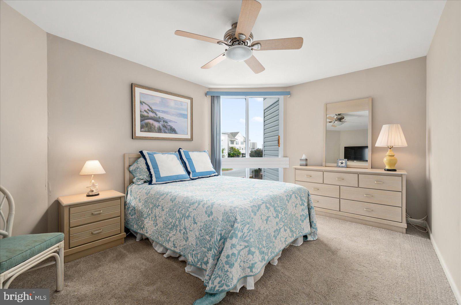 775 94th Street, Unit 775 Ocean City, MD 21842 - Photo 20 of 57 a bed room with a bed and a dresser