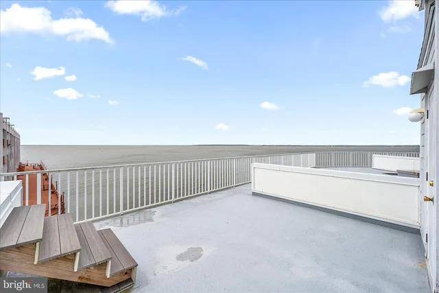 a view of a room with air conditioner and windows