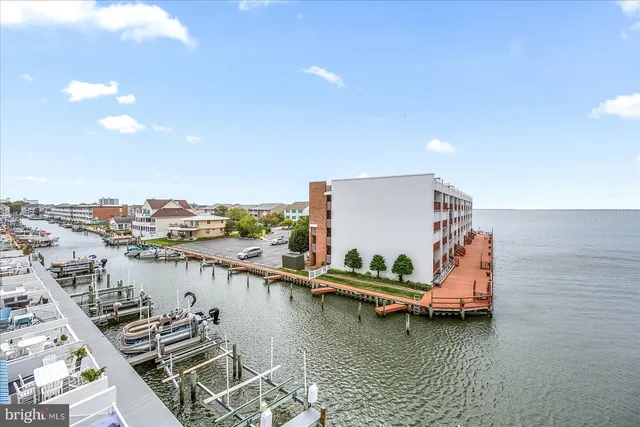 a view of an empty room and floor to ceiling window