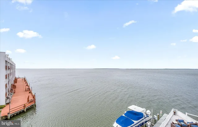 a view of staircase with white walls
