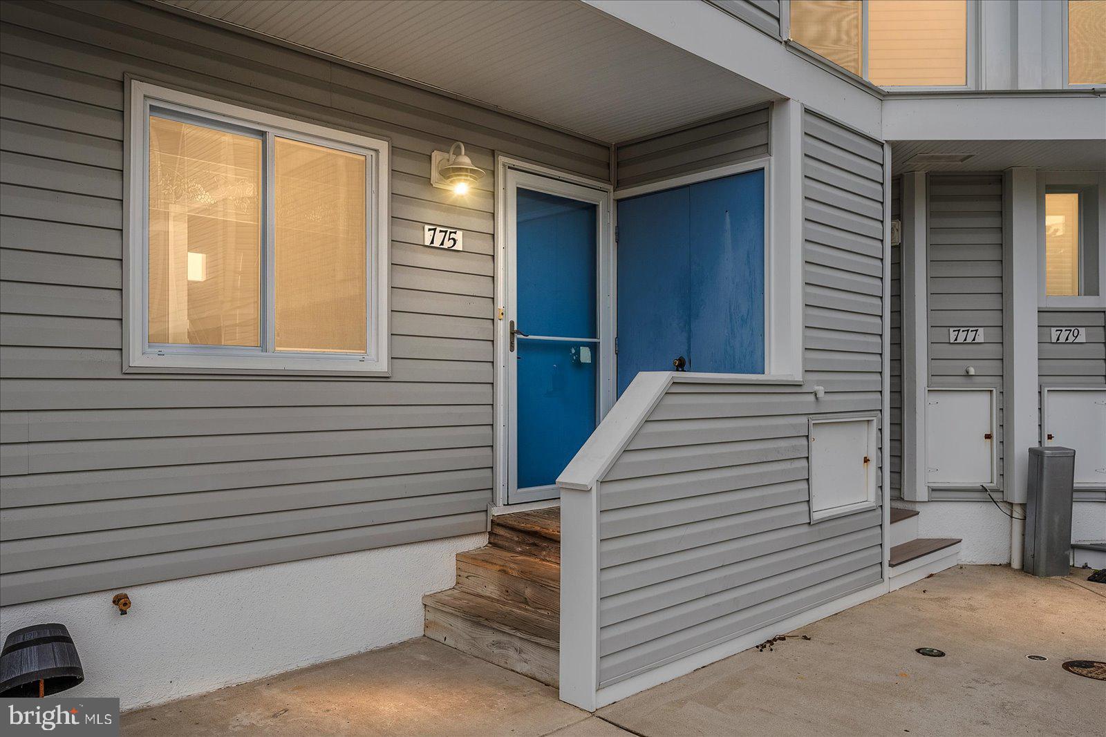 775 94th Street, Unit 775 Ocean City, MD 21842 - Photo 4 of 57 a view of a house with a door and a window