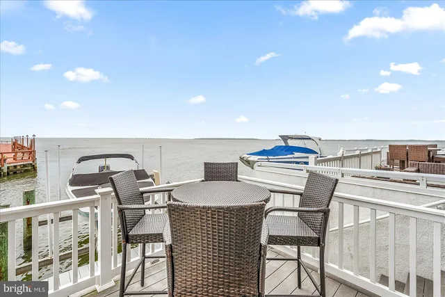a view of a balcony with chairs