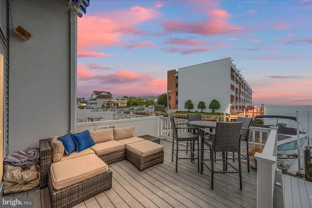 a view of a terrace with furniture