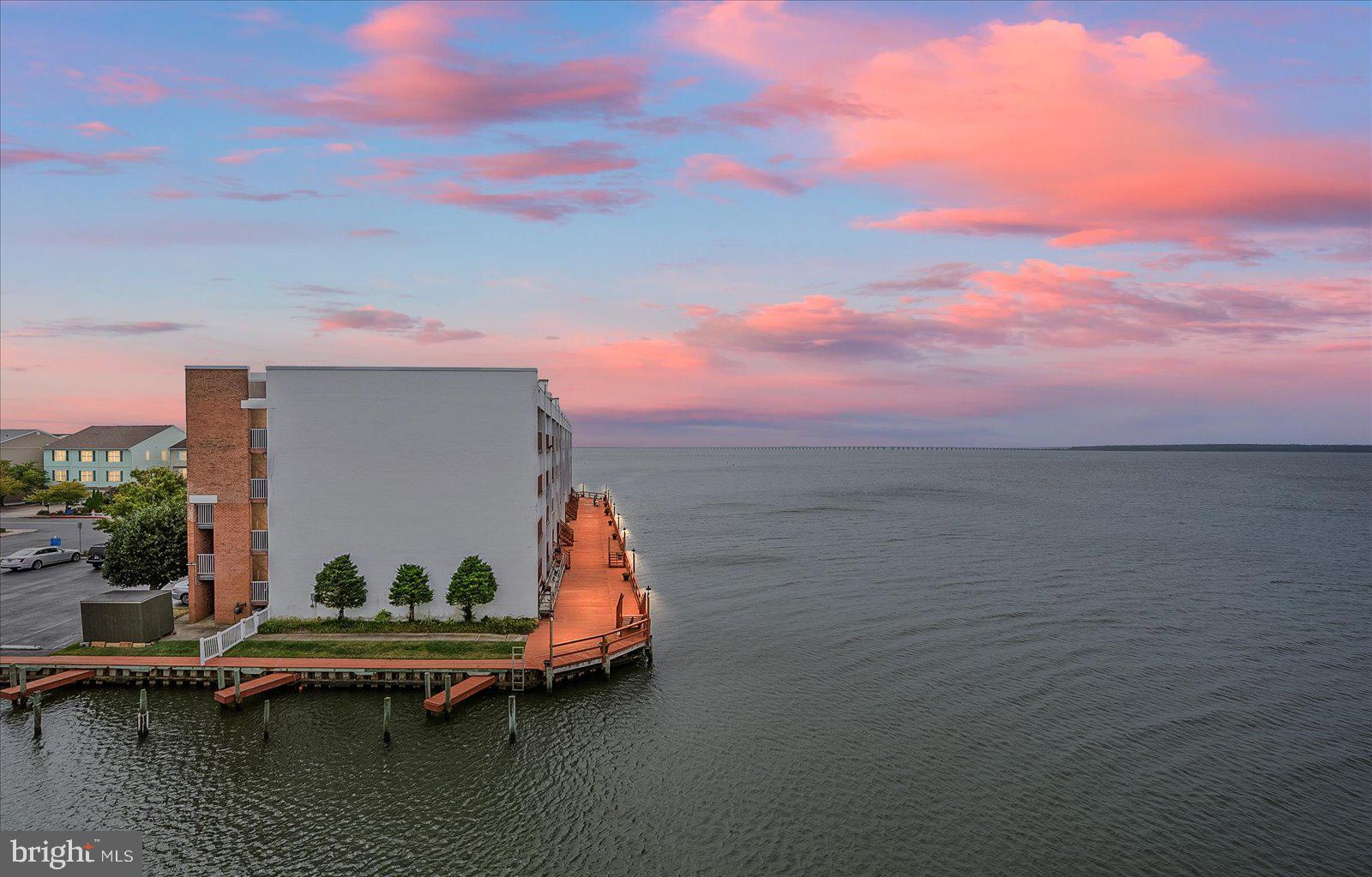 775 94th Street, Unit 775 Ocean City, MD 21842 - Photo 6 of 57 a view of a lake with a terrace