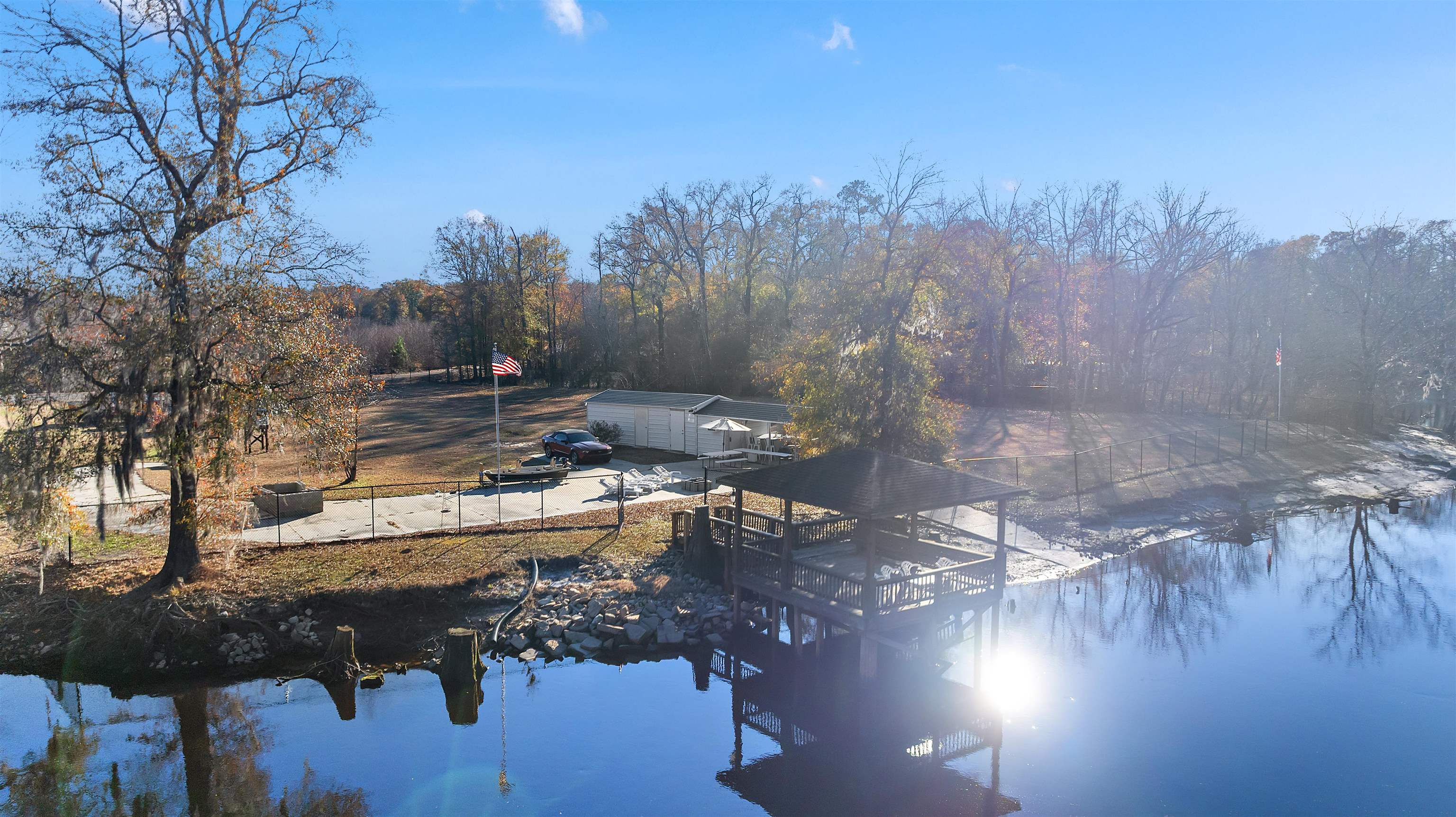 3429 River Road Nichols, SC 29581 - Photo 16 of 46 View from the river featuring a gazebo and a boat ramp