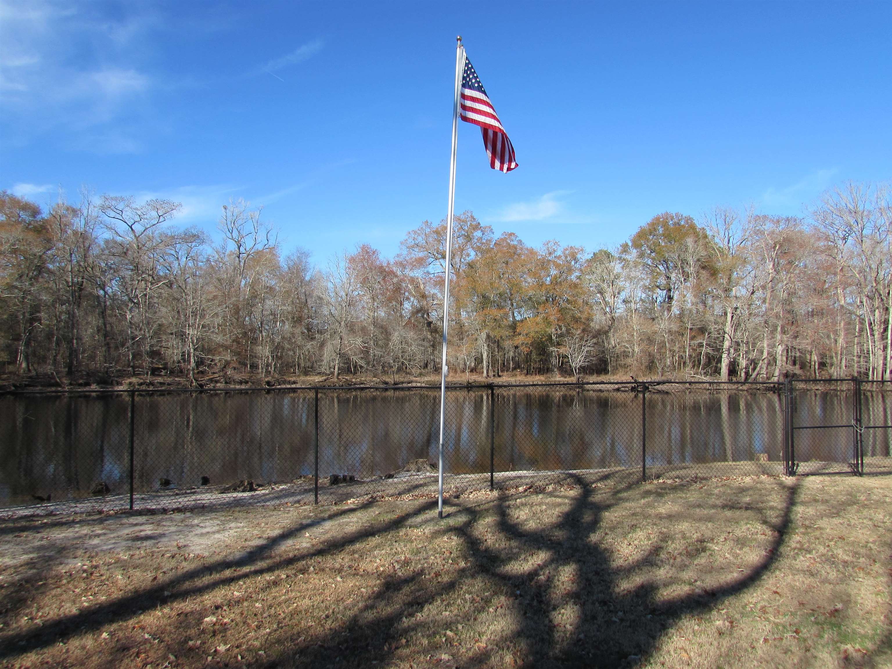 3429 River Road Nichols, SC 29581 - Photo 32 of 46 View of flagpole and river from the left side lot