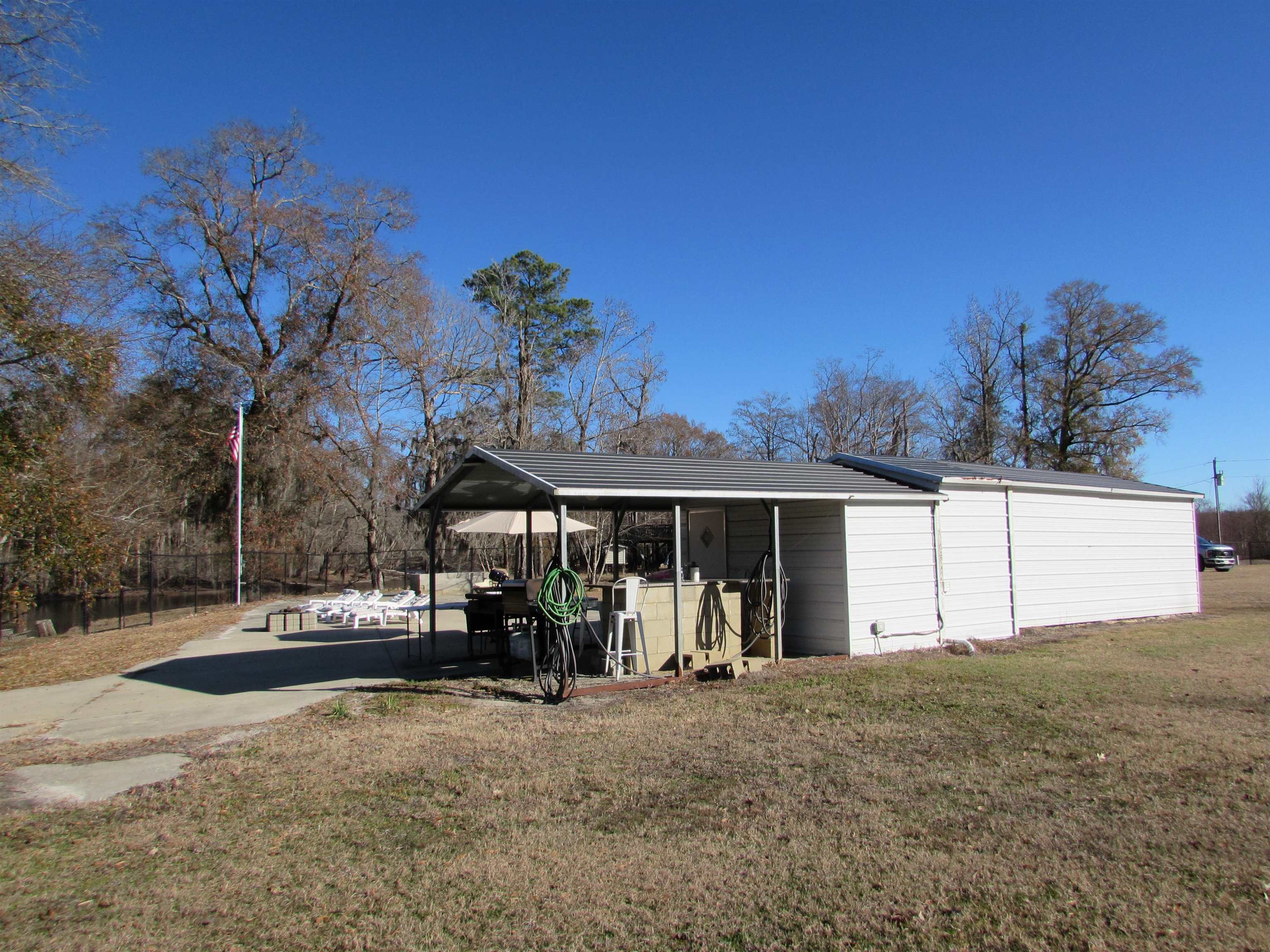 3429 River Road Nichols, SC 29581 - Photo 34 of 46 View of the building and outside kitchen