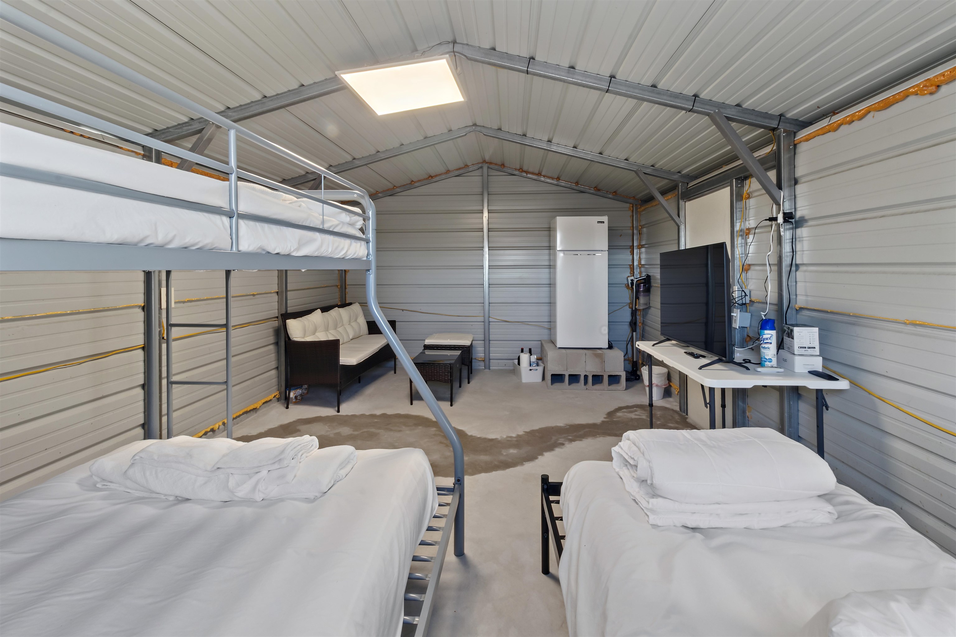 3429 River Road Nichols, SC 29581 - Photo 6 of 26 Bunkhouse featuring beds, TV, fridge and Wi-Fi