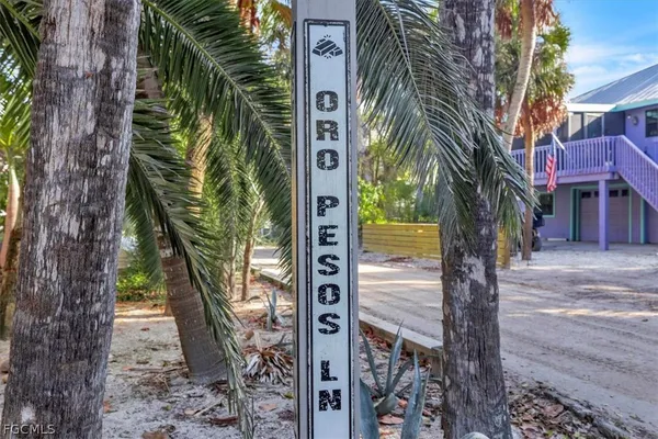 a sign that is on the side of a road