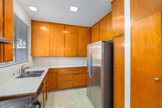 a bathroom with a sink and a large mirror