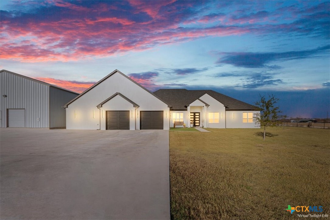 10940 Wedel Cemetery Road Rogers, TX 76569 - Photo 1 of 48 a view of a house with a yard