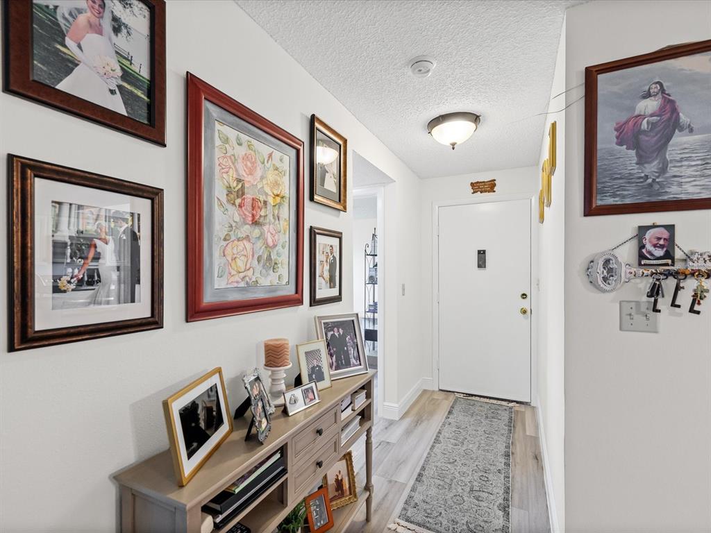 9615 Midiron Court, Unit 9615 New Port Richey, FL 34655 - Photo 20 of 36 a view of a livingroom with furniture and workspace