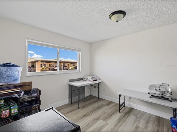 a view of a workspace with furniture