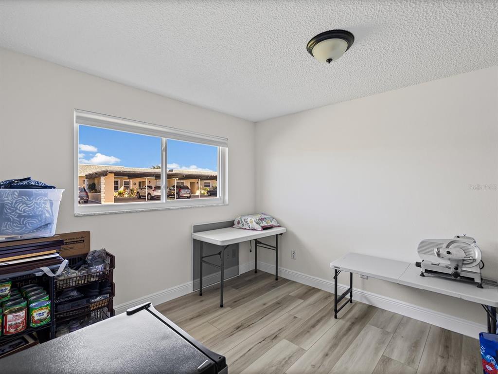 9615 Midiron Court, Unit 9615 New Port Richey, FL 34655 - Photo 25 of 36 a view of a workspace with furniture