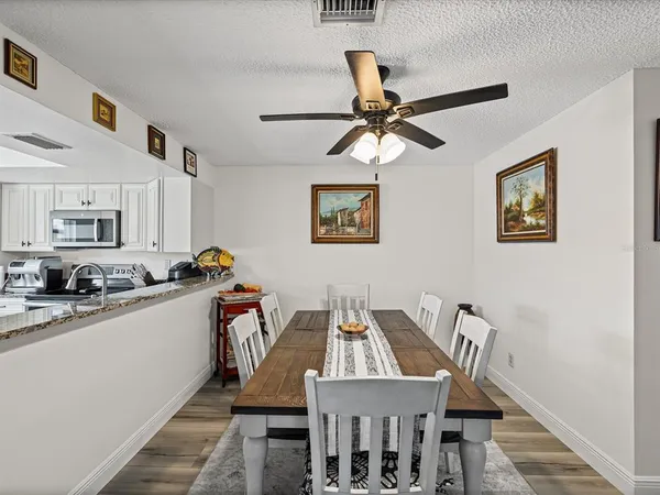 a view of a dining room with furniture