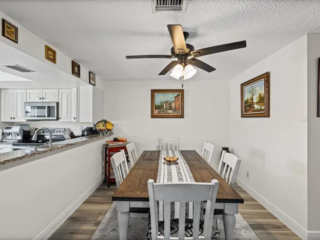 a view of a dining room with furniture
