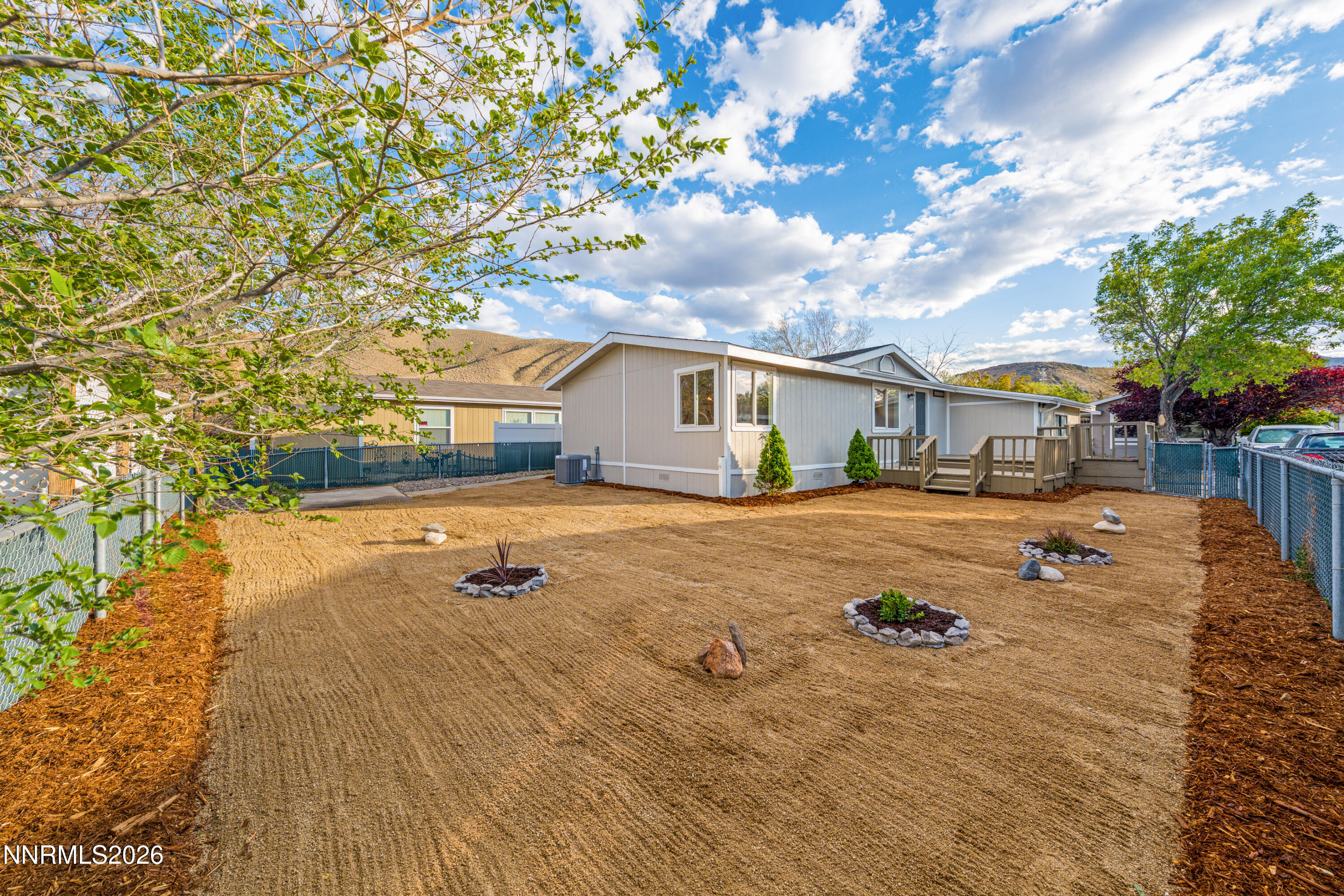 239 Rue De La Chartreuse Sparks, NV 89434 - Photo 16 of 24 a view of house with yard