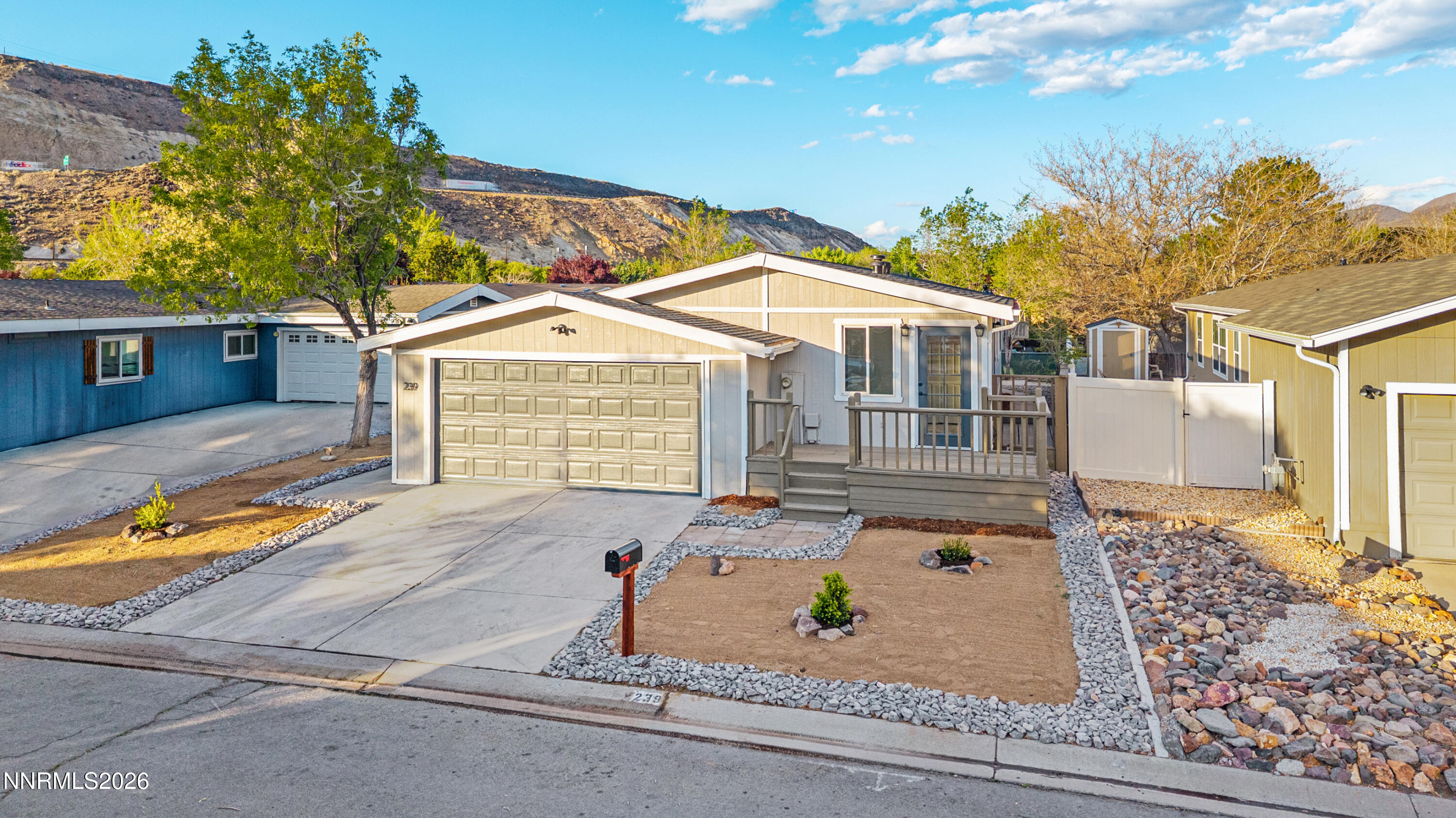 239 Rue De La Chartreuse Sparks, NV 89434 - Photo 19 of 24 a front view of a house with garden