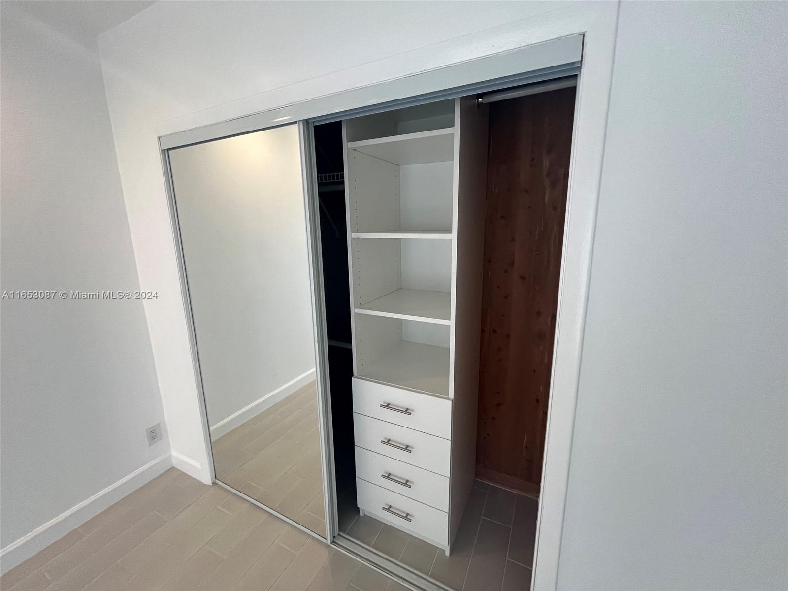 3475 Southwest 1st Avenue, Unit 7 Miami, FL 33145 - Photo 11 of 17 a view of walk in closet