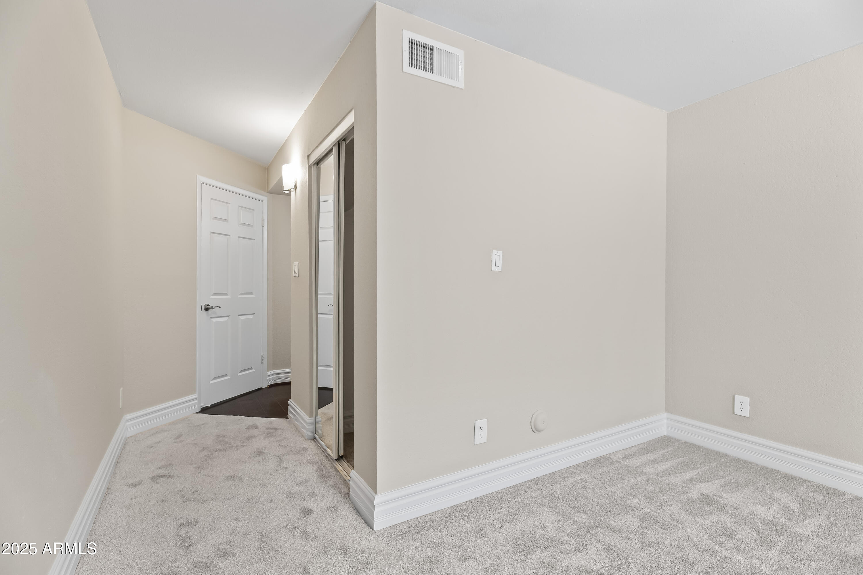 3825 East Camelback Road, Unit 114 Phoenix, AZ 85018 - Photo 16 of 21 an empty room with a empty space