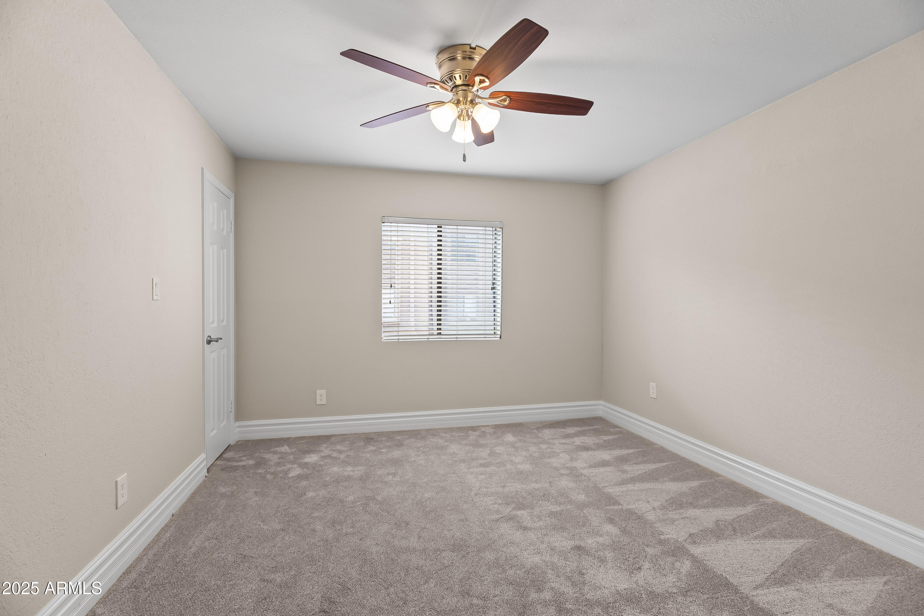 3825 East Camelback Road, Unit 114 Phoenix, AZ 85018 - Photo 5 of 21 an empty room