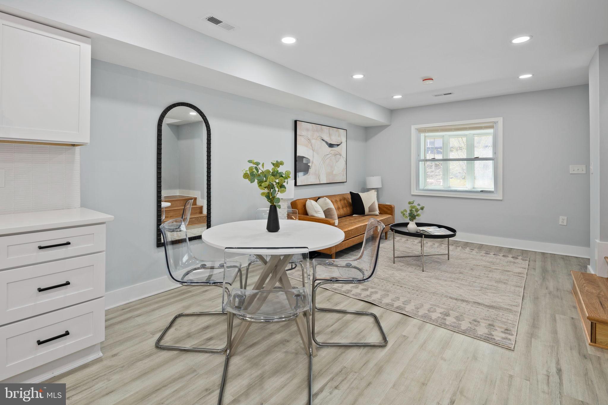 3418 Baker Street Northeast Washington, DC 20019 - Photo 11 of 46 a living room with furniture and a window