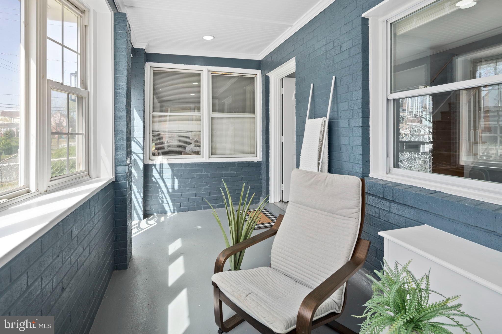 3418 Baker Street Northeast Washington, DC 20019 - Photo 22 of 46 a view of a dining room with furniture window and wooden floor