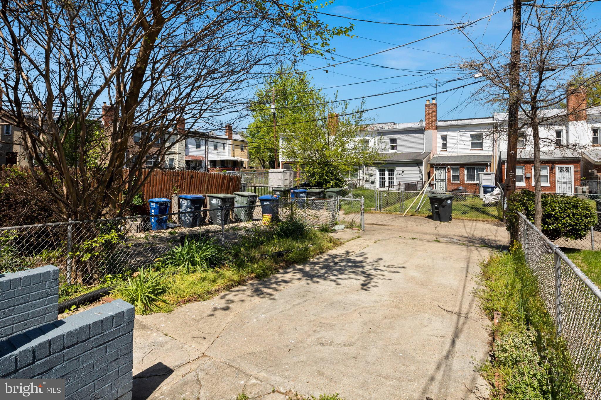 3418 Baker Street Northeast Washington, DC 20019 - Photo 24 of 46 a view of a house with a yard