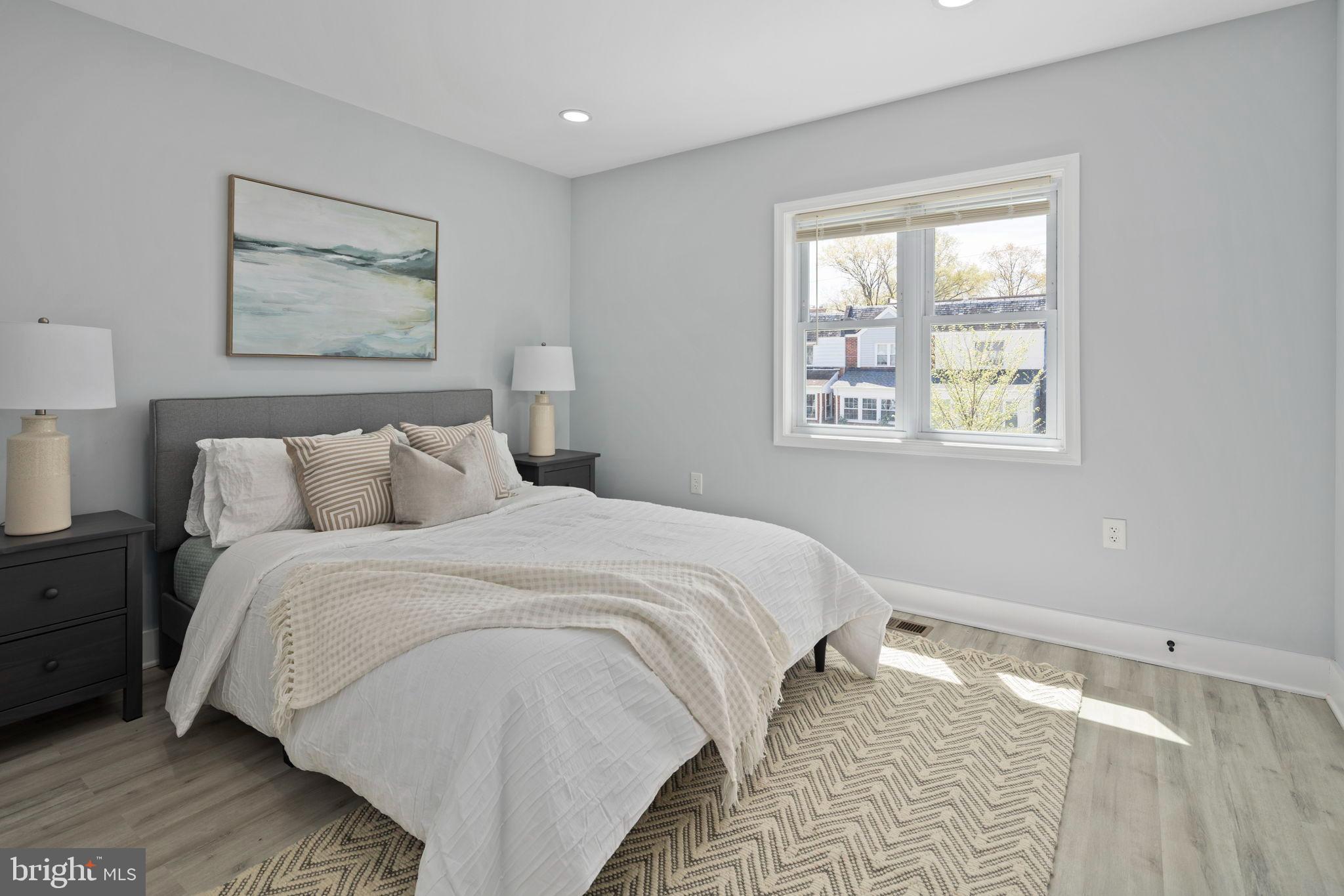 3418 Baker Street Northeast Washington, DC 20019 - Photo 34 of 46 a bedroom with bed and a window