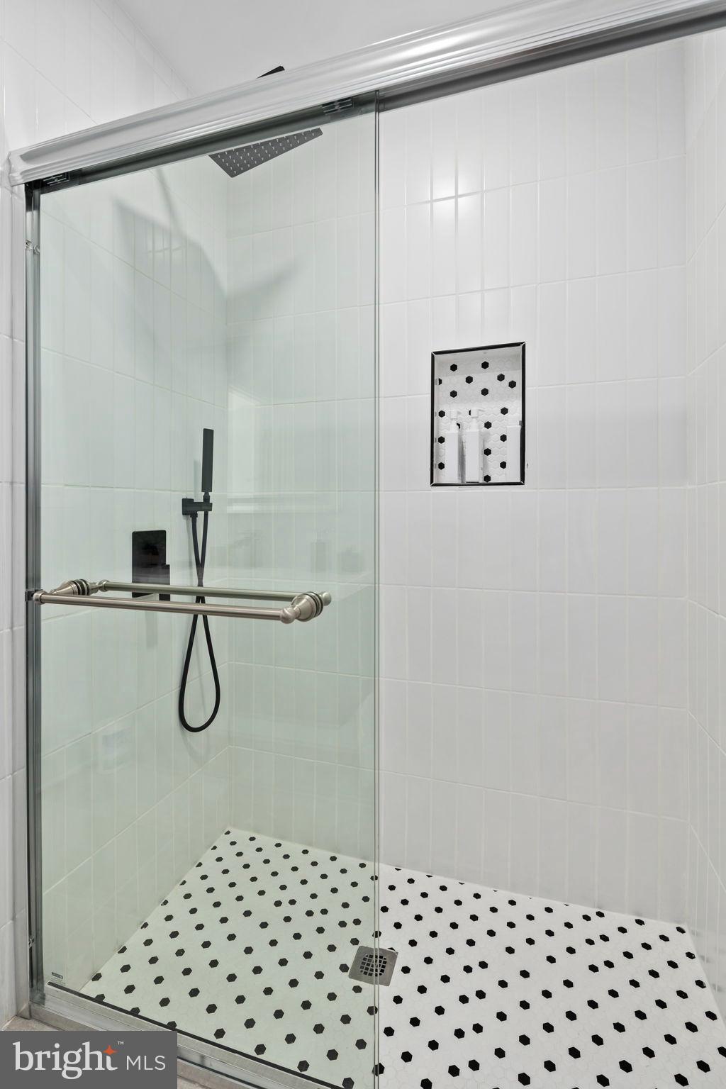 3418 Baker Street Northeast Washington, DC 20019 - Photo 37 of 46 a bathroom with a shower